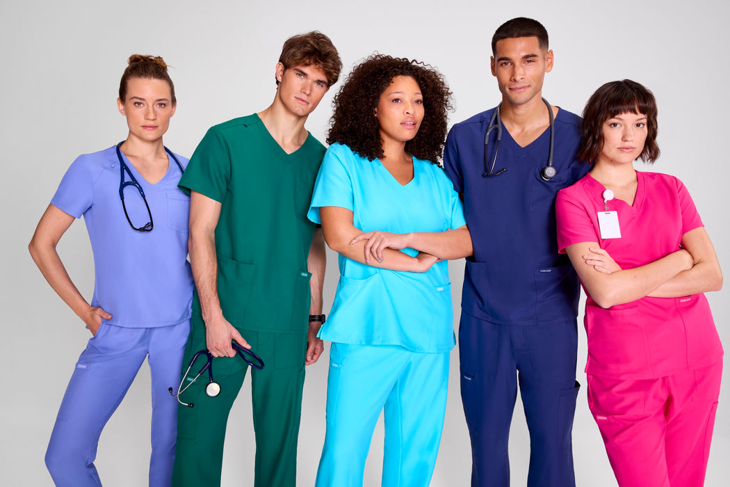 Five healthcare professionals wearing scrubs from Medical Uniforms NZ